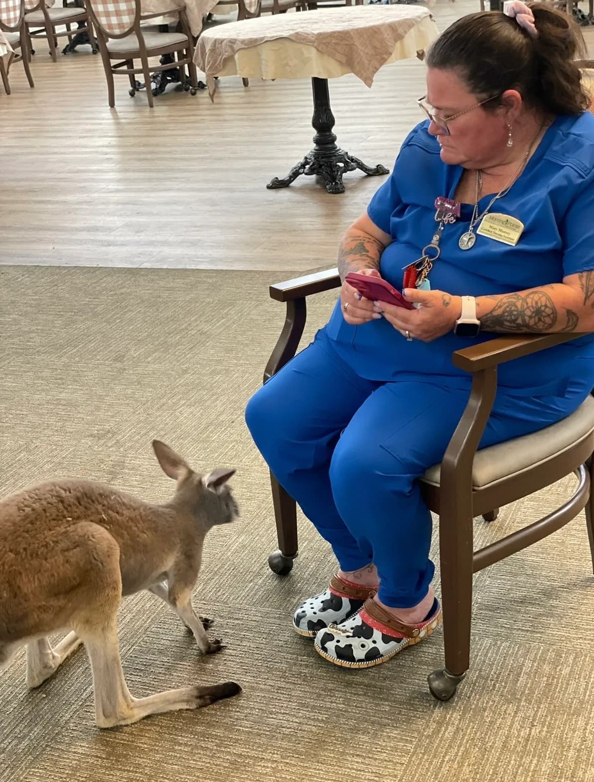 Nursing home staff with kangaroo
